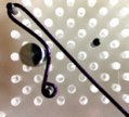 Instructions for making Beaded Chandelier Earrings Step 5 showing WigJig jewelry tools used to shape jewelry wire.