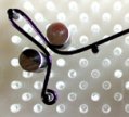 Step 6 to instructions for making Beaded Chandelier Earrings by shaping jewelry wire on WigJig jewelry making tool.